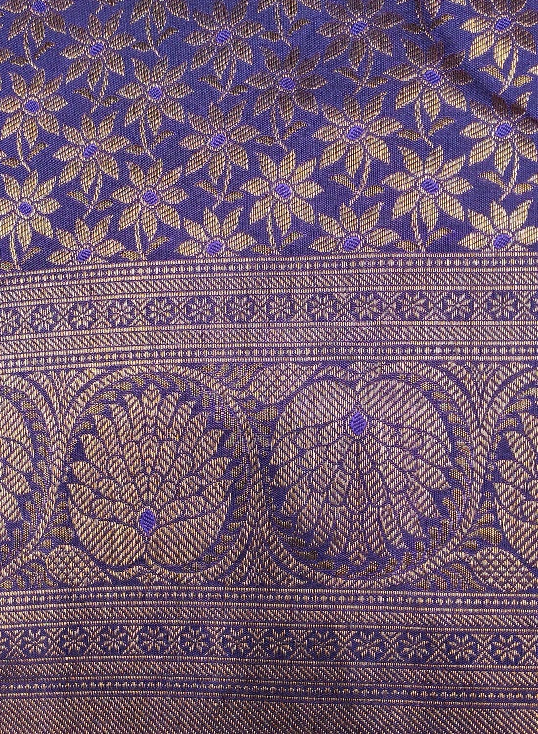 Navy blue Kanjivaram silk covered in gold zari flowers